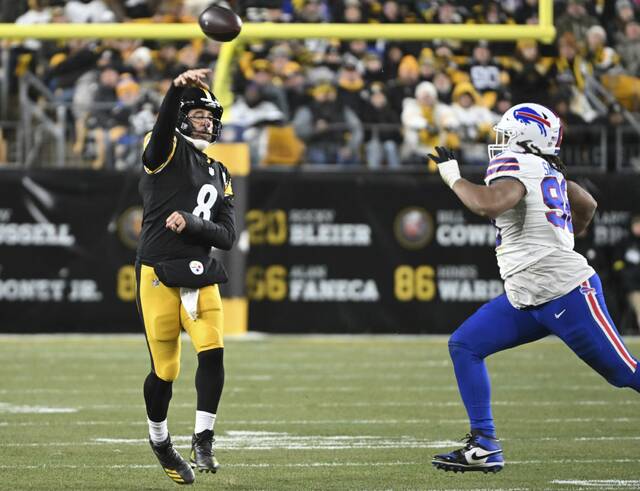 Steelers quarterback Aaron Rodgers throws under duress against the Bills in the second quarter Sunday Nov. 30, 2025 at Acrisure Stadium. (Chaz Palla | TribLive)