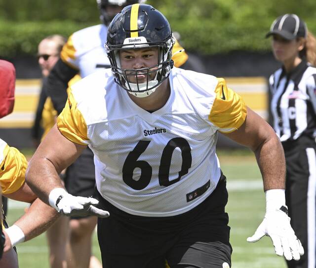 Pittsburgh Steelers offensive tackle Dylan Cook goes through drills during the 2024 minicamp at the UPMC Rooney Sports Complex. Cook is on the practice squad but was elevated to the gameday roster for Sunday at the Baltimore Ravens. (Chaz Palla | TribLive)