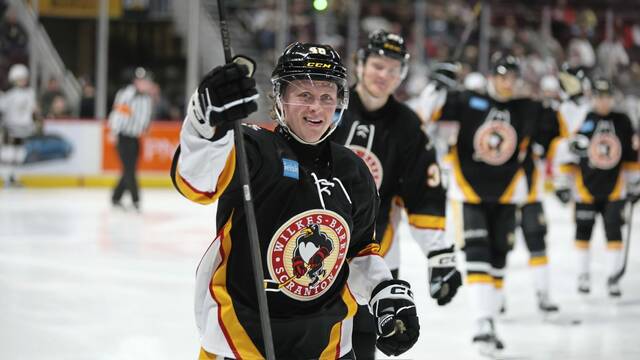 Wilkes-Barre/Scranton Penguins forward Valtteri Puustinen (No. 48) celebrates with teammates during a 4-1 win against the Hershey Bears at the Giant Center in Hershey on Saturday. (Hershey Bears)