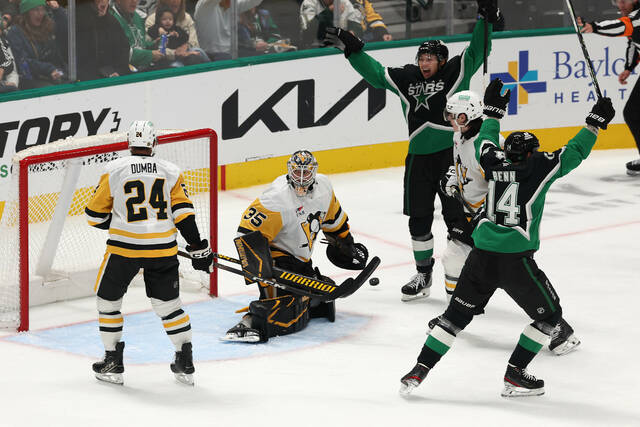 Penguins goaltender Tristan Jarry looks back after allowing a goal to Stars defenseman Miro Heiskanen (not shown) during the third period Sunday. (AP)