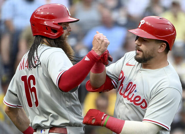 The Phillies’ Kyle Schwarber celebrates his two-run home run with Brandon Marsh during the third inning against the Pirates on Friday, July 28, 2023, at PNC Park. (Christopher Horner | TribLive)