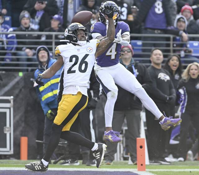 Pittsburgh Steelers cornerback Brandin Echols defends on a pass intended for Baltimore Ravens receiver Zay Flowers during the first quarter of Sunday’s game at M&T Bank Stadium. Echols and James Pierre are cornerbacks who entered the season relatively unheralded but have excelled with increased opportunity in recent weeks. (Chaz Palla | TribLive)