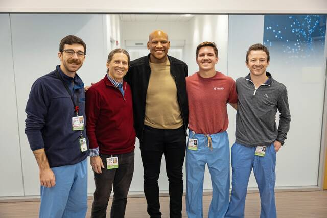 Former Steelers linebacker Ryan Shazier reunites with members of the medical team Dec. 4, 2025, at UC Medical Center where he was treated for a spinal cord injury in 2017. (Courtesy of UC Medial Center)