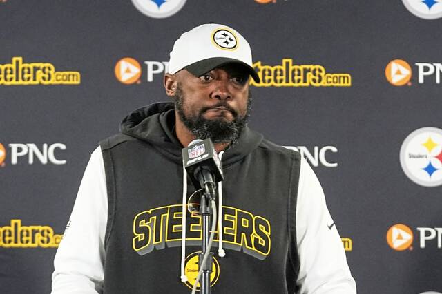Shown while meeting with reporters following the Nov. 23 loss at the Chicago Bears, Pittsburgh Steelers coach Mike Tomlin moved into a tie for 10th place in the NFL’s all-time coaching wins list when the Steelers won at the Baltimore Ravens this past Sunday. (AP)