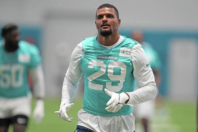 Shown while running drills during the Miami Dolphins’ training camp in July, safety Minkah Fitzpatrick spent six seasons with the Pittsburgh Steelers before being traded back to the Dolphins in June. The Steelers host Miami on Monday. (AP)