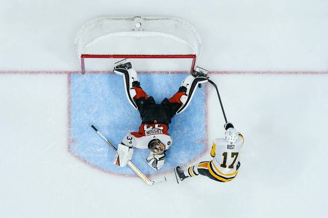 Penguins forward Bryan Rust is denied by Philadelphia Flyers goaltender Samuel Ersson on a shootout attempt during a game at the Xfinity Mobile Arena in Philadelphia on Oct. 28. (AP)