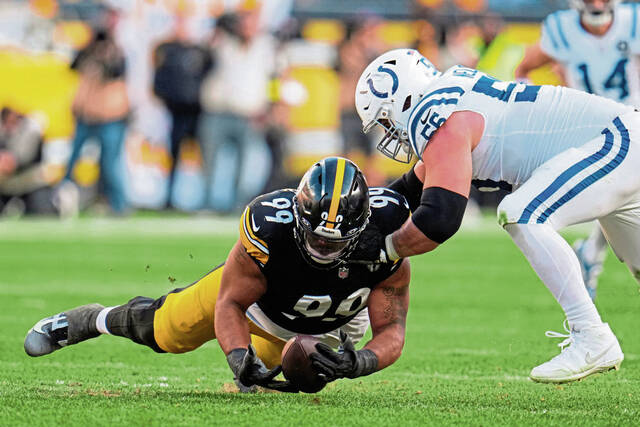 Pittsburgh Steelers defensive tackle Derrick Harmon recovers a fumble under Indianapolis Colts guard Quenton Nelson the Nov. 2 game at Acrisure Stadium. Harmon has missed the past two games because of a knee injury. (AP)