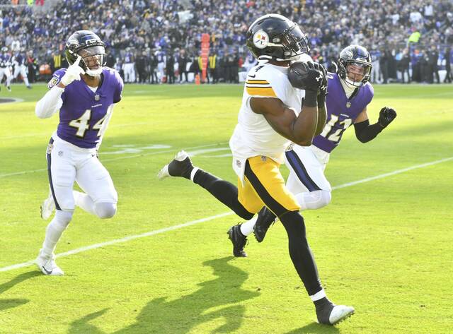 Steelers receiver DK Metcalf beats the Ravens’ Marlon Humphrey and Aloha Gilman in the first quarter Sunday, Dec. 7, 2025 at M&T Bank Stadium. (Chaz Palla | TribLive)