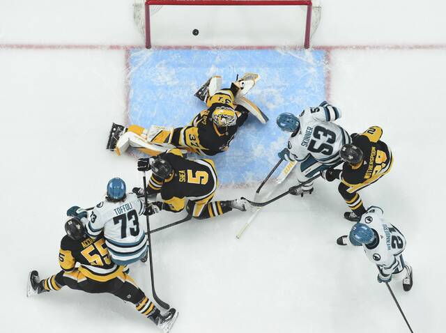 The Sharks’ Tyler Toffoli ties the game late in the third period as the Penguins blow a four-goal lead Saturday at PPG Paints Arena. (Chaz Palla | TribLive)