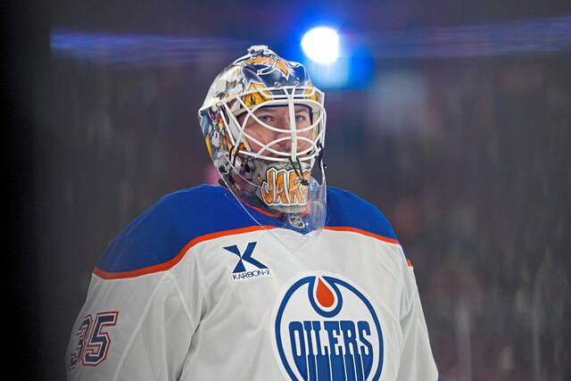 Edmonton Oilers goalie Tristan Jarry warms up before a Dec. 14 game against the Canadiens at Bell Centre in Montreal, Quebec. (NHLI via Getty Images)