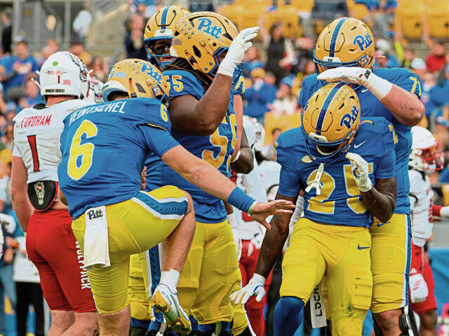 Pitt’s Mason Heintschel (6), Ja’ Kyrian Turner, BJ Williams (55) and Ryan Carretta (71) celebrate in the end zone following a touchdown on Saturday, Oct. 25, 2025, at Acrisure Stadium. (Andrew Palla | For TribLive)