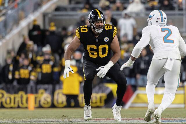 Steelers tackle Dylan Cook blocks against the Dolphins’ Bradley Chubb on Monday. (AP)