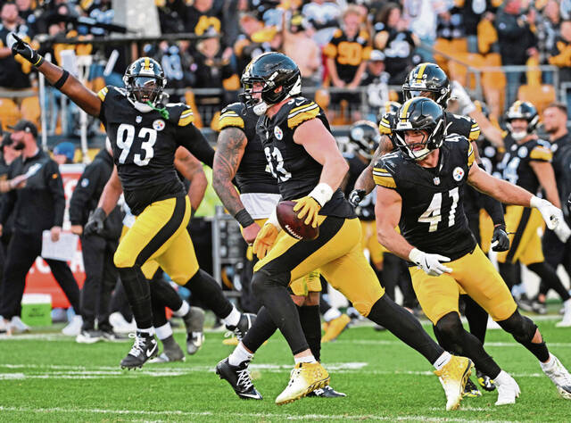 The Steelers’ Jack Sawyer celebrates his interception against the Colts in the third quarter Sunday Nov. 2, 2025 at Acrisure Stadium. (Chaz Palla | TribLive)