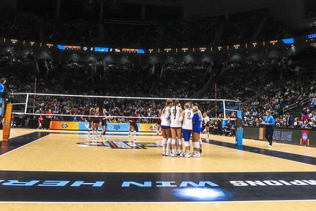 Pitt volleyball players huddle during their national semifinal against Texas A&M on Thursday in Kansas City, Mo. (Pitt Athletics)