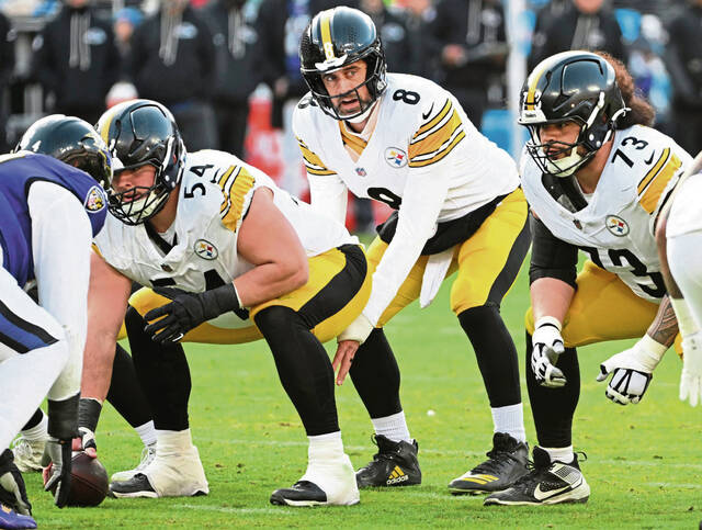 Pittsburgh Steelers quarterback Aaron Rodgers, center Zach Frazier and left guard Isaac Seumalo line up during the Dec. 7 game against the Baltimore Ravens. (Chaz Palla | TribLive)